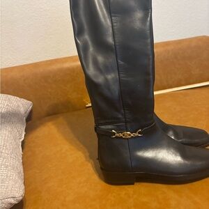 Black Knee-High Leather Boots with Gold Accent